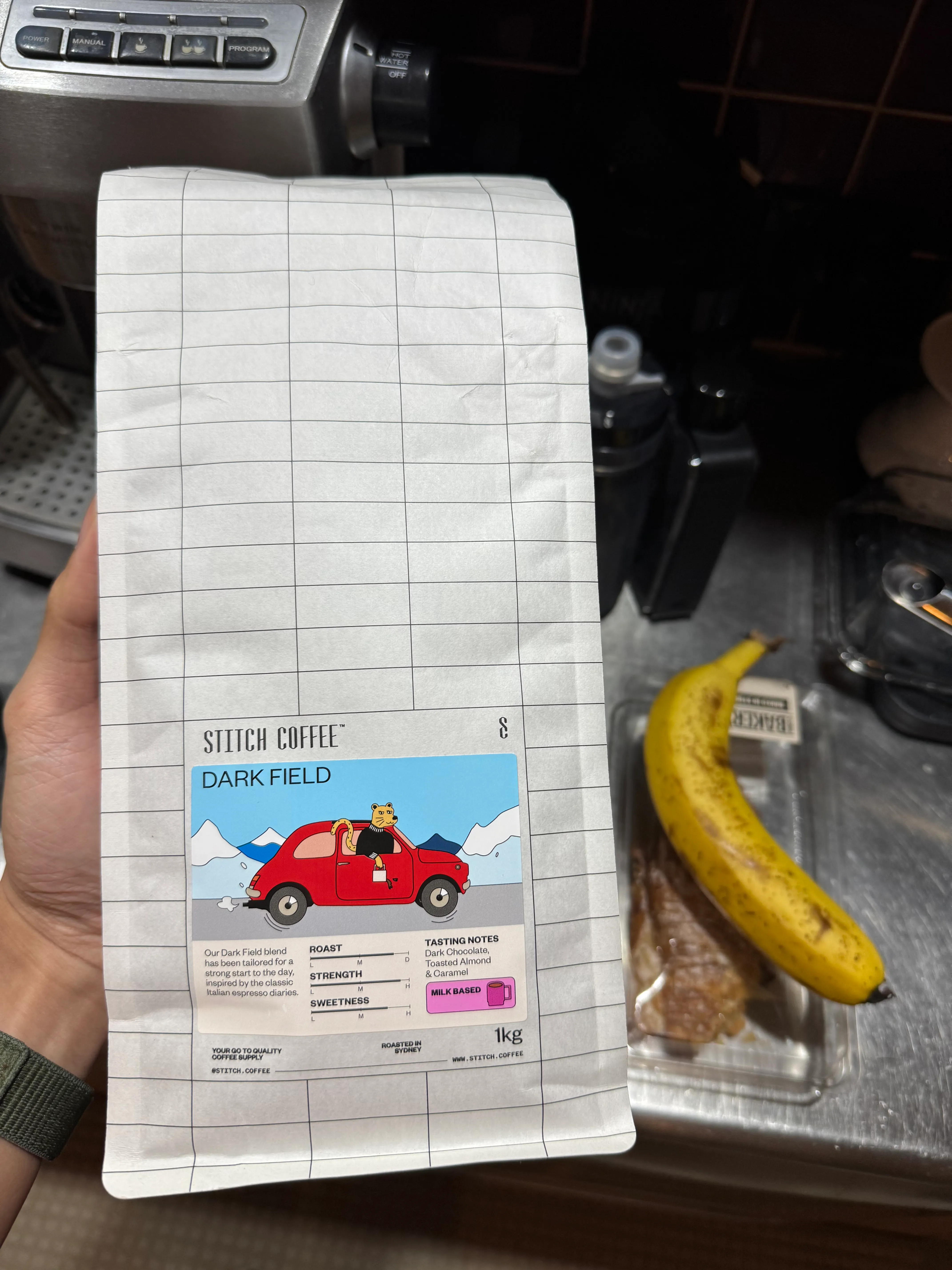 My first 1 kg coffee beans. I've never hold this much coffee in one hand before. Taken at 2025-12-06.